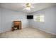 Bright bedroom with neutral walls and a window at 1918 Ne 9Th St, Ocala, FL 34470