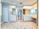 Double vanity bathroom with a view into bedroom at 1945 Sw 40Th Pl, Ocala, FL 34471