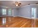 Bright bedroom with hardwood floors and walk-in closet at 1945 Sw 40Th Pl, Ocala, FL 34471
