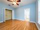 Bedroom with hardwood floors and closet at 1945 Sw 40Th Pl, Ocala, FL 34471