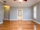 Spacious bedroom with hardwood floors and ensuite bathroom at 1945 Sw 40Th Pl, Ocala, FL 34471
