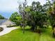 House exterior with driveway and landscaping at 1945 Sw 40Th Pl, Ocala, FL 34471