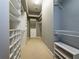 Large walk-in closet with shelving and drawers at 1945 Sw 40Th Pl, Ocala, FL 34471