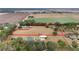 Aerial view of property showing home, acreage, and outbuildings at 21959 Nw 6Th St, Dunnellon, FL 34431