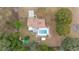 Overhead view of home, pool, and surrounding trees at 21959 Nw 6Th St, Dunnellon, FL 34431