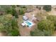 Aerial view showing home, pool, and surrounding landscape at 21959 Nw 6Th St, Dunnellon, FL 34431