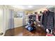 Bedroom with window, wood floors and shelving at 21959 Nw 6Th St, Dunnellon, FL 34431