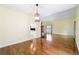 Open dining area with hardwood floors and kitchen access at 21959 Nw 6Th St, Dunnellon, FL 34431