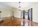 Spacious dining room with hardwood floors and views of the backyard at 21959 Nw 6Th St, Dunnellon, FL 34431
