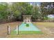 Spacious dog run with artificial turf and shelter at 21959 Nw 6Th St, Dunnellon, FL 34431
