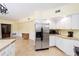 Kitchen boasts stainless steel appliances and ample counter space at 21959 Nw 6Th St, Dunnellon, FL 34431
