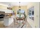 Kitchen nook with pool view and seating for four at 21959 Nw 6Th St, Dunnellon, FL 34431