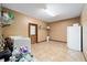 Laundry room with washer, dryer, and extra refrigerator at 21959 Nw 6Th St, Dunnellon, FL 34431