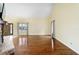 Bright living room featuring hardwood floors and large windows at 21959 Nw 6Th St, Dunnellon, FL 34431
