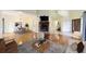 Open living space with hardwood floors, fireplace, and dining area at 21959 Nw 6Th St, Dunnellon, FL 34431
