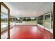 Spacious screened porch overlooking the pool and backyard at 21959 Nw 6Th St, Dunnellon, FL 34431