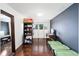 Bright sitting room with hardwood floors and built-in shelving at 21959 Nw 6Th St, Dunnellon, FL 34431