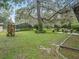 Large backyard with pool, shed, and lush landscaping at 10502 Se 29Th Ave, Ocala, FL 34480