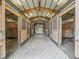 Bright barn interior with multiple stalls and high ceilings at 10502 Se 29Th Ave, Ocala, FL 34480