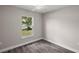 Bedroom with ceiling fan and a large window at 330 Locust Pass, Ocala, FL 34480