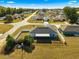 Aerial view showcasing the home's backyard, fenced area, and neighborhood setting at 3321 Sw 153Rd Place Rd, Ocala, FL 34473