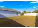 Large backyard with grassy area and privacy fence at 3321 Sw 153Rd Place Rd, Ocala, FL 34473