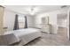 Bedroom with wood-look floors and ceiling fan at 3321 Sw 153Rd Place Rd, Ocala, FL 34473