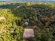 Aerial view of community amenities including tennis courts and a pool at 3321 Sw 153Rd Place Rd, Ocala, FL 34473
