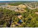 Aerial view of community with tennis courts and pool, showing house location at 3321 Sw 153Rd Place Rd, Ocala, FL 34473