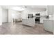 Modern kitchen with white cabinets and granite countertops at 3321 Sw 153Rd Place Rd, Ocala, FL 34473