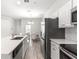 Kitchen features stainless steel appliances and an island at 3321 Sw 153Rd Place Rd, Ocala, FL 34473