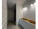 Bathroom with vanity, shower, and tile flooring at 4477 Sw 90Th Pl, Ocala, FL 34476