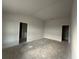 Large bedroom with neutral walls and plenty of space at 4477 Sw 90Th Pl, Ocala, FL 34476