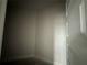 Spacious walk-in closet with ample storage space at 4477 Sw 90Th Pl, Ocala, FL 34476