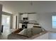 Modern kitchen with white cabinets and stainless steel appliances at 4477 Sw 90Th Pl, Ocala, FL 34476