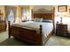 Spacious bedroom with a king-size bed and two nightstands with lamps at 4707 River Ridge Dr, Leesburg, FL 34748