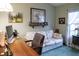 Home office featuring a work desk and comfy couch at 4707 River Ridge Dr, Leesburg, FL 34748