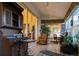Relaxing sunroom with comfortable seating and plenty of natural light at 4707 River Ridge Dr, Leesburg, FL 34748