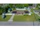 Aerial view of house, yard, and surrounding neighborhood at 6931 Se 54Th St, Ocala, FL 34472