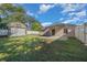 Backyard with shed, patio, and grassy area at 6931 Se 54Th St, Ocala, FL 34472