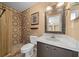 Clean bathroom with shower/tub, vanity, and decorative mirror at 6931 Se 54Th St, Ocala, FL 34472