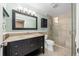Clean bathroom, featuring granite countertop and walk-in shower at 6931 Se 54Th St, Ocala, FL 34472