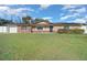 House exterior with solar panels and landscaping at 6931 Se 54Th St, Ocala, FL 34472