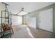 Garage with storage cabinets and overhead door at 6931 Se 54Th St, Ocala, FL 34472