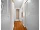 Bright hallway with wood floors and built-in storage at 6931 Se 54Th St, Ocala, FL 34472