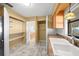 Kitchen with double sink, ample storage and pantry at 6931 Se 54Th St, Ocala, FL 34472