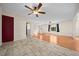 Spacious living room with hardwood floors and ceiling fan at 6931 Se 54Th St, Ocala, FL 34472