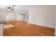 Living room with hardwood floors and ceiling fan at 6931 Se 54Th St, Ocala, FL 34472