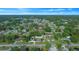 Aerial view of suburban neighborhood with tree-lined streets at 6931 Se 54Th St, Ocala, FL 34472