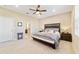 Spacious bedroom with carpeted floors and ensuite bathroom at 9002 Sw 75Th Loop, Ocala, FL 34481